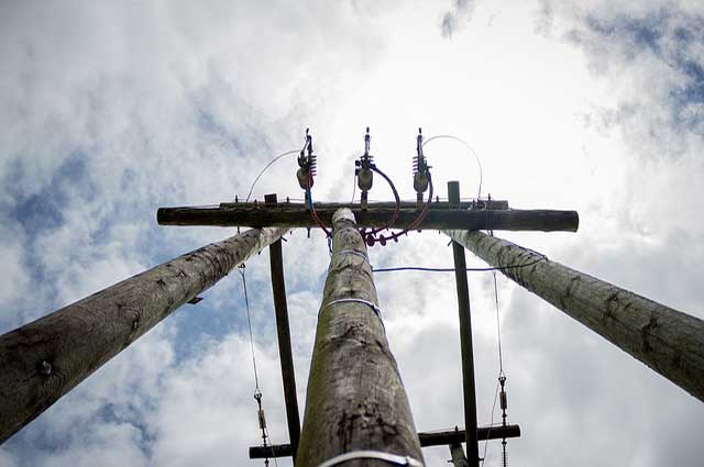 Power pole electrical installation in a rural Arizona setting